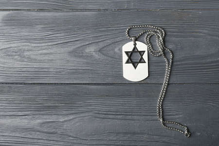 Military tag of Israeli soldier on wooden backgroundの写真素材