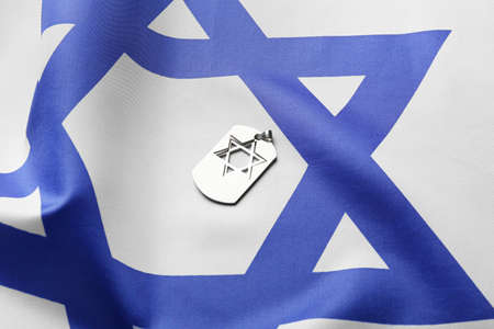 Military tag on flag of Israelの写真素材