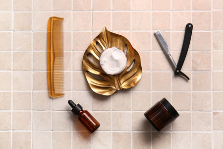 Stylish male accessories for shaving and comb on tile backgroundの写真素材