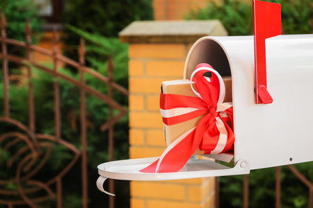 Mailbox with beautiful gift outdoorsの写真素材