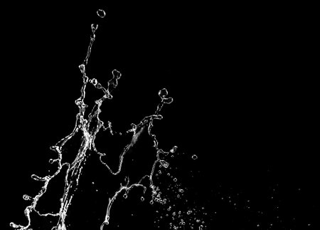 Splash of water on black backgroundの写真素材