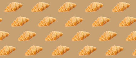 Many fresh croissants on beige background. pattern for designの写真素材