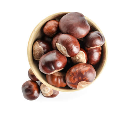 Bowl of chestnuts isolated on white backgroundの写真素材