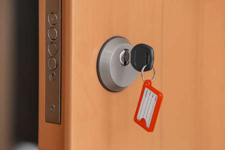 Key inserted in door hole, closeup