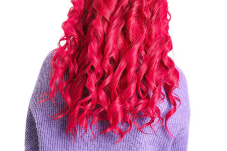 Beautiful woman with unusual bright hair color on white background, back view
