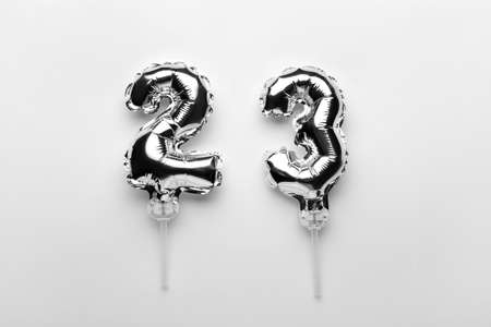Figure 23 made of silver balloons on light backgroundの写真素材