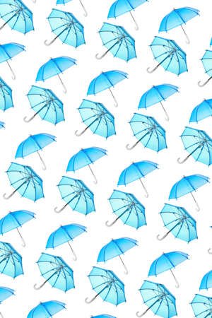Many blue umbrellas on white background. Pattern for designの写真素材