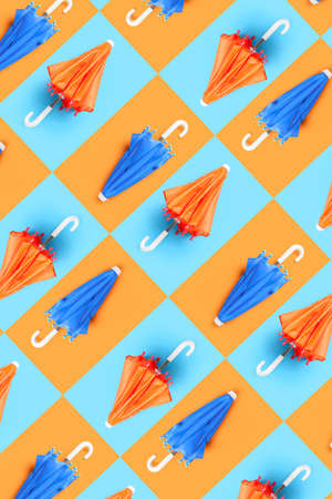 Many umbrellas on colorful background. pattern for design