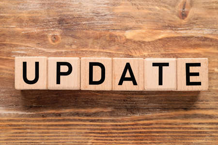 Cubes with word UPDATE on wooden backgroundの写真素材