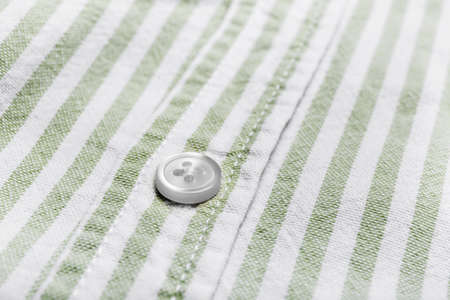 Striped shirt with button, closeupの写真素材