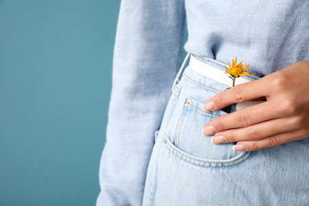 Woman holding beautiful flower, closeupの写真素材