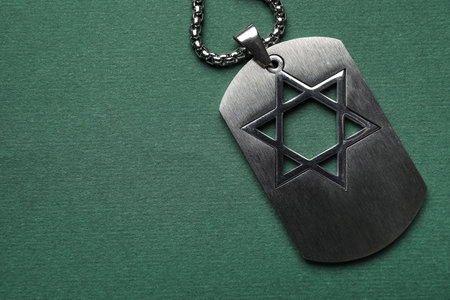 Military tag of Israeli soldier on color backgroundの写真素材