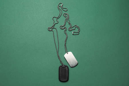military dog tags on color backgroundの写真素材