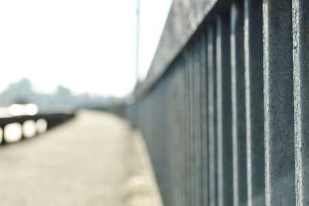 View of old fence on city street, closeupの写真素材
