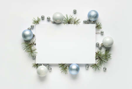 Blank card and Christmas decor on white backgroundの写真素材