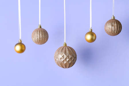 Beautiful Christmas balls on lilac backgroundの写真素材