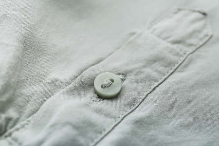 Button on stylish shirt, closeupの写真素材