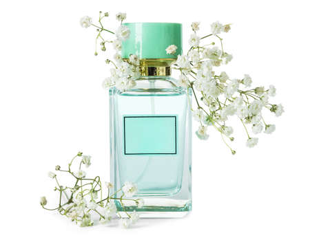 Bottle of aromatic perfume and gypsophila flowers on white backgroundの写真素材