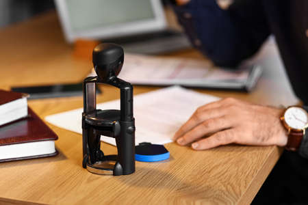 Stamp on table of notary public in office