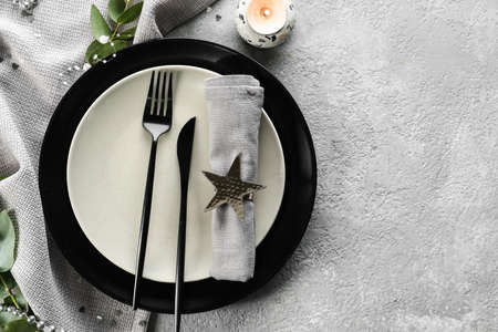 Beautiful table setting for wedding on gray background