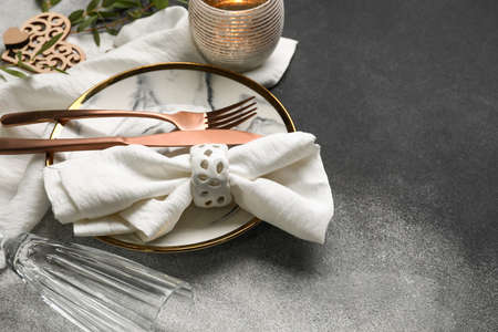 Beautiful table setting for wedding on grunge background