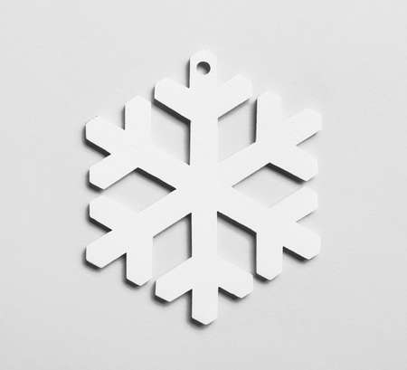 Beautiful snowflake on light backgroundの写真素材