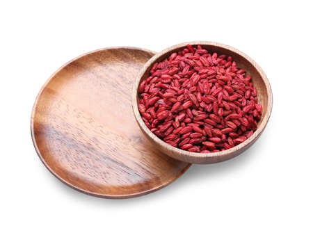 Bowl with dried barberry on white background