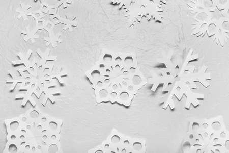 Beautiful paper snowflakes on light backgroundの写真素材