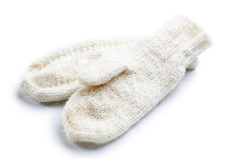 Warm mittens on white backgroundの写真素材
