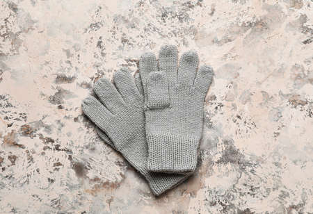 Pair of warm mittens on grunge backgroundの写真素材