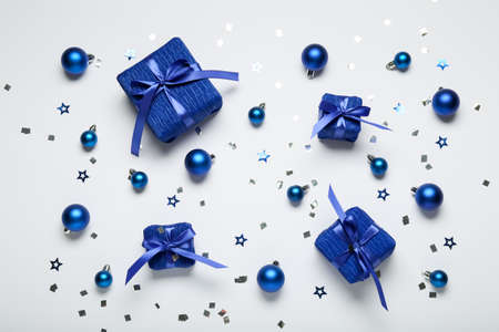 Composition with Christmas gift boxes and balls on white backgroundの写真素材