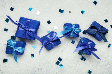 Christmas gift boxes on white snowの写真素材