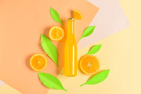 Composition with bottle of tasty soda on color backgroundの写真素材