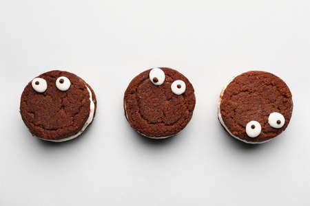 Funny cookies on light background