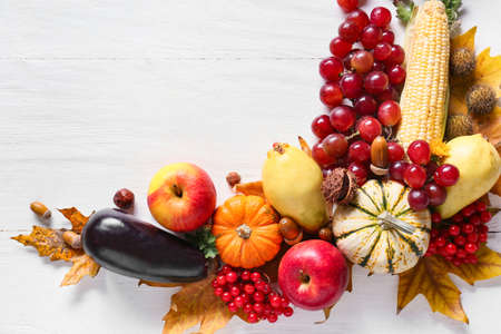 Different healthy food on light wooden background. harvest festival