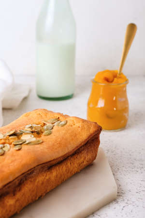 Fresh pumpkin pie on white background, closeup