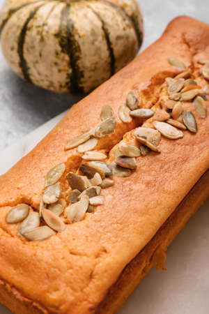 Fresh pumpkin pie on light background, closeup