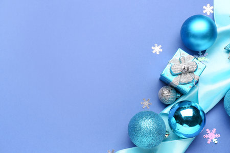 Stylish Christmas decor on blue backgroundの写真素材