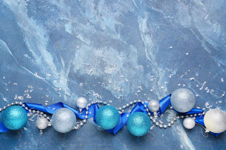 Beautiful Christmas balls on blue backgroundの写真素材