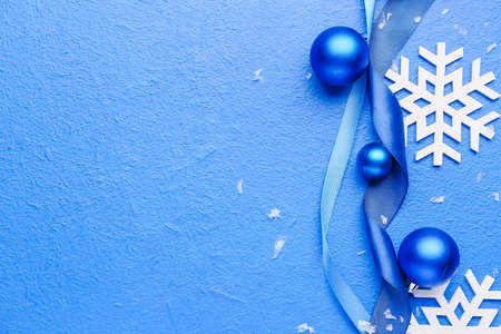 Stylish Christmas decor on blue backgroundの写真素材