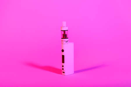 Modern vape mod on color backgroundの写真素材