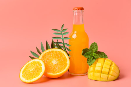 Bottle of tasty soda and fruits on color background