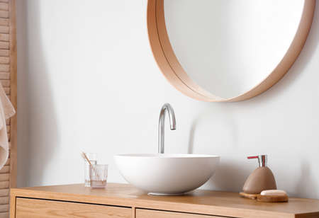 Sink in interior of light bathroomの写真素材