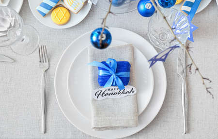 Beautiful table setting for Hanukkah celebration, top view