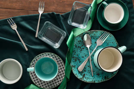 Set of stylish dinnerware on wooden backgroundの写真素材