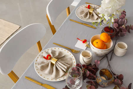 Beautiful table setting for Chinese New Year celebration in room