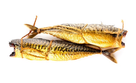 Tasty smoked mackerel fishes on white backgroundの写真素材