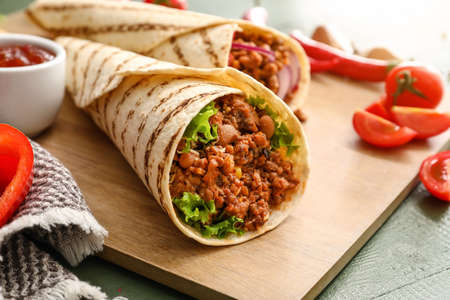 Tasty burrito on table, closeupの写真素材