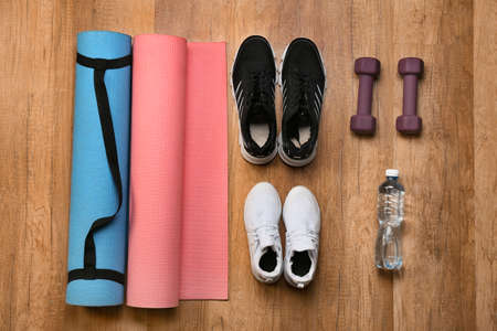 Stylish sport equipment on wooden backgroundの写真素材