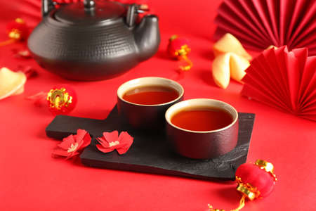 Tasty Chinese tea on color backgroundの写真素材